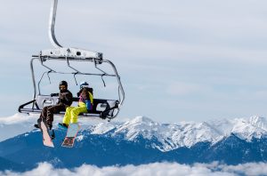 snowboarders on chairlift